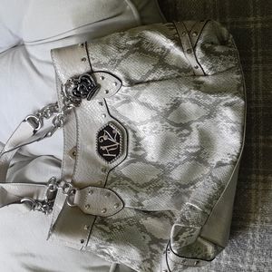 Kathy Van Zeeland white and cream snake skin style purse.